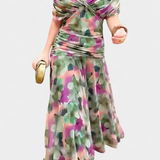 Magda™ | Vネックの花柄ロングドレス
