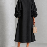 Selma | Schwarzes Midikleid mit Puffärmeln, Blumenknöpfen und Blumenmanschetten