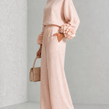 Liva | Rosa Set mit Blumenmanschetten und weiten Hosen