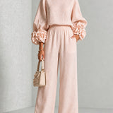 Liva | Rosa Set mit Blumenmanschetten und weiten Hosen