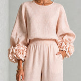 Liva | Rosa Set mit Blumenmanschetten und weiten Hosen
