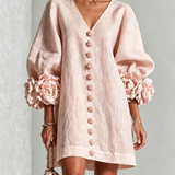 Ella | Rosa Minikleid mit V-Ausschnitt, Puffärmeln und Blumenmanschetten